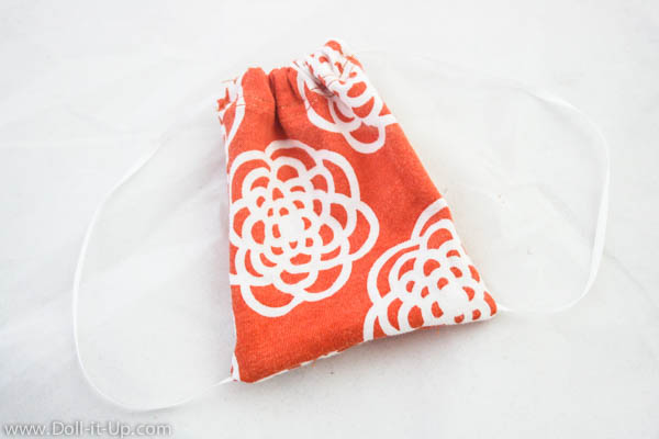 Make matching drawstring backpacks for girls and dolls from a girls shirt-6